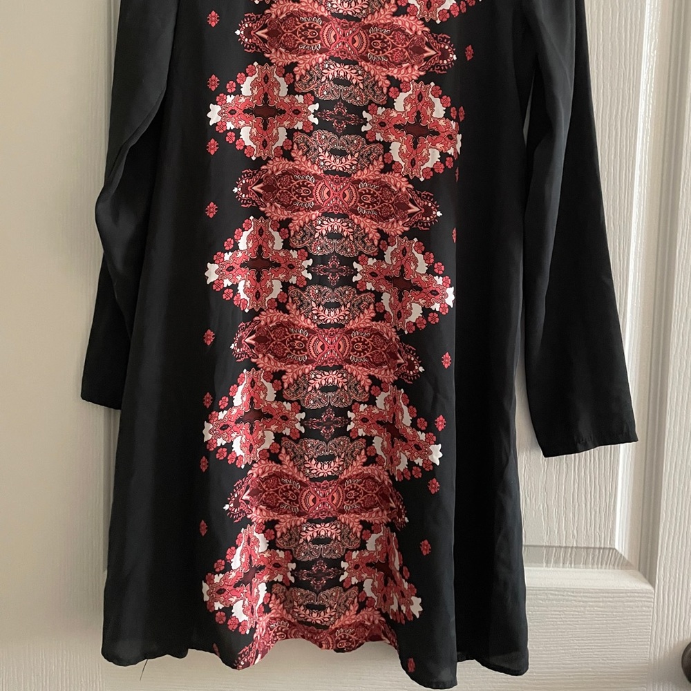 Red paisley on black dress